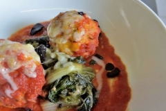 Griggstown Chicken Meatballs: Fontina Stuffed, Braised Local Greens, Black Truffle Tomato Pan Gravy
