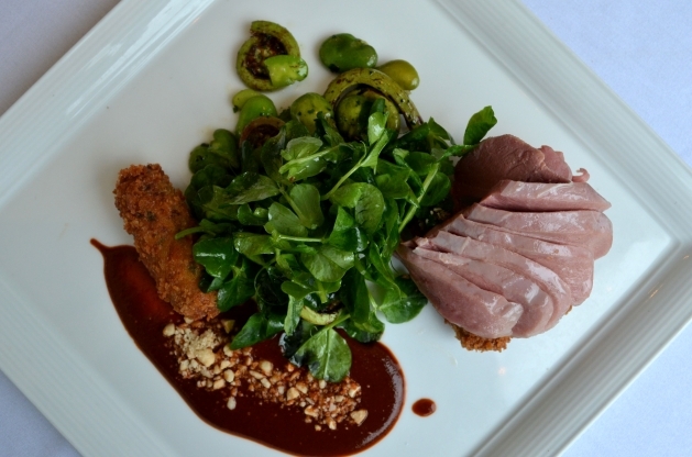 Poached Long Island Duck Breast, Cured Leg Croqueta, Fava Beans, Fiddlehead Ferns, Ancho Chili Romesco